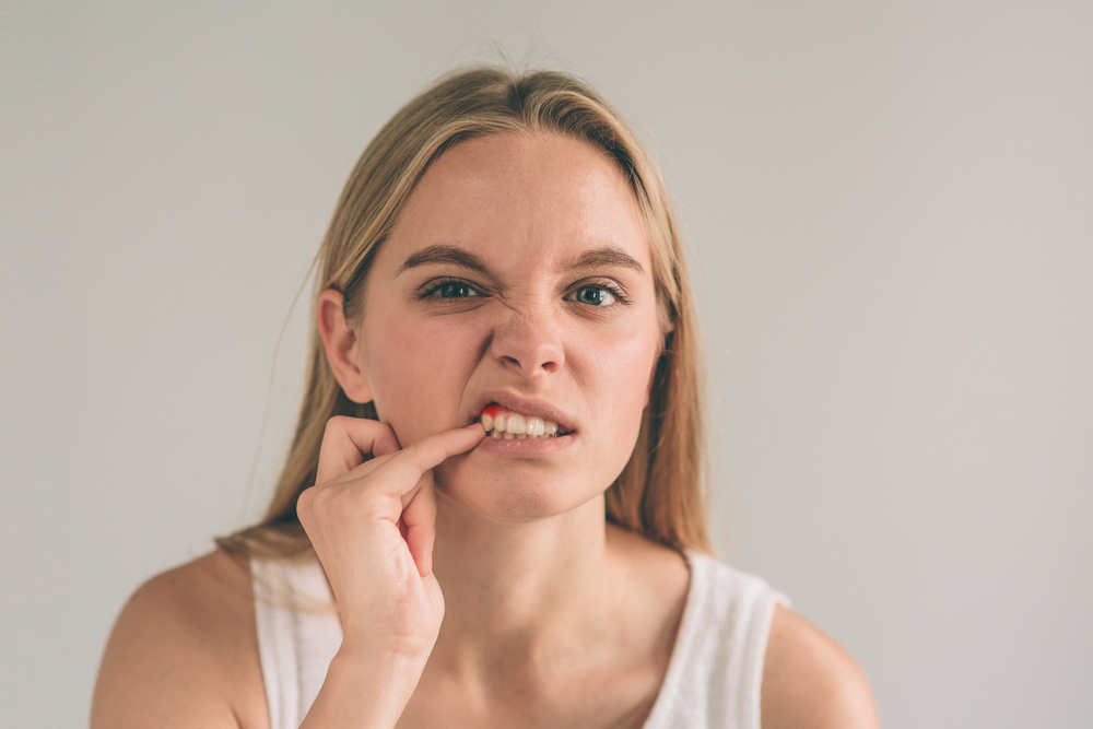 when you floss with braces, your gums may be irritated