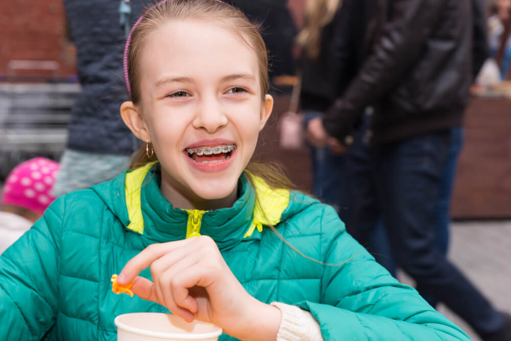 Girl wondering, Can you eat nuts with braces?